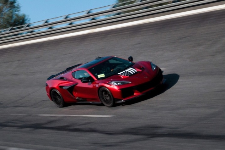 2025 Chevrolet Corvette ZR1 blazing down the Papenburg test track, showcasing its aerodynamic design and record-breaking speed