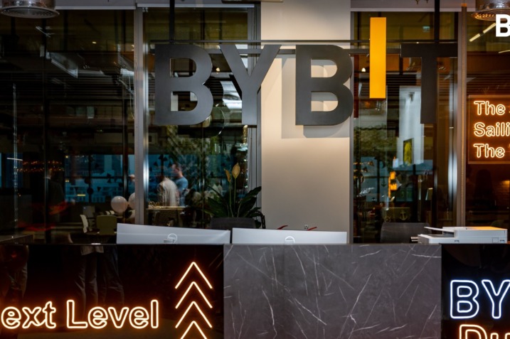 Bybit and DMCC-hosted Web3 Unleashed event showcasing finalists presenting their innovative blockchain projects on stage in Dubai.