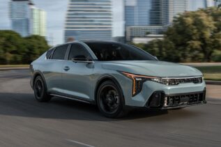 Front view of the 2025 Kia K4 compact sedan with a focus on safety and design.