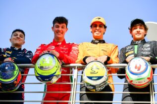Isack Hadjar celebrating on the podium during his F2 season.