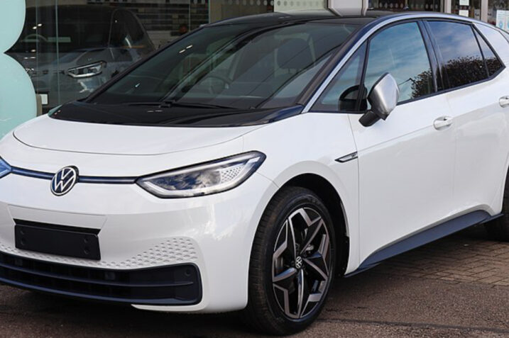 An illustrative image showing a Volkswagen ID.3 electric car with a digital map overlay, symbolizing GPS data tracking and cybersecurity concerns.