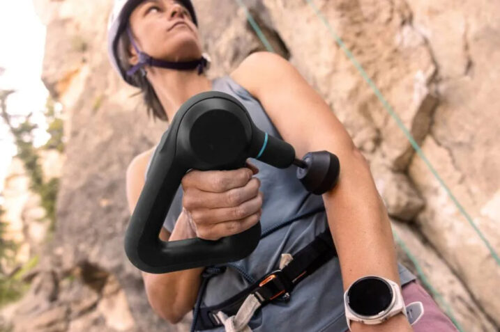 Therabody Coach interface displaying personalized recovery recommendations alongside a Theragun Pro Plus device